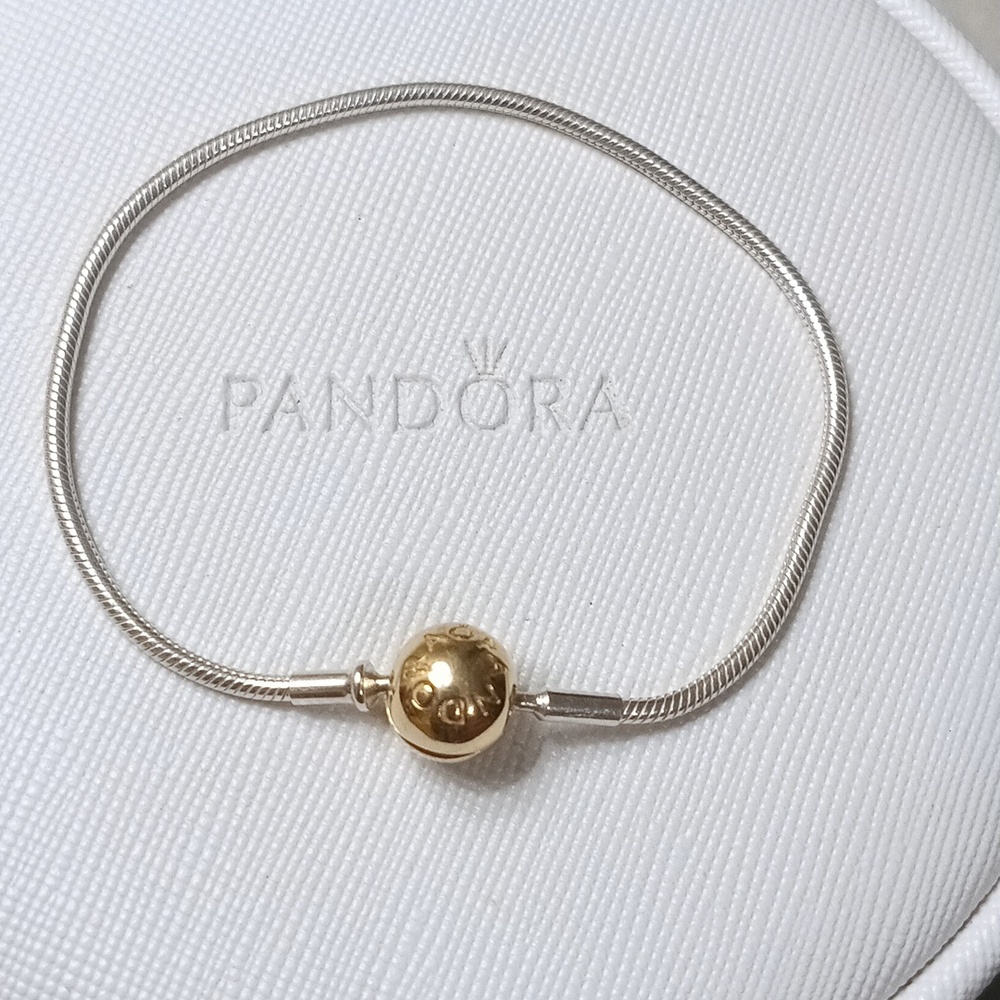Pandora Essence 14k Gold Clasp & Silver Bracelet. Price firm Unless Bundled